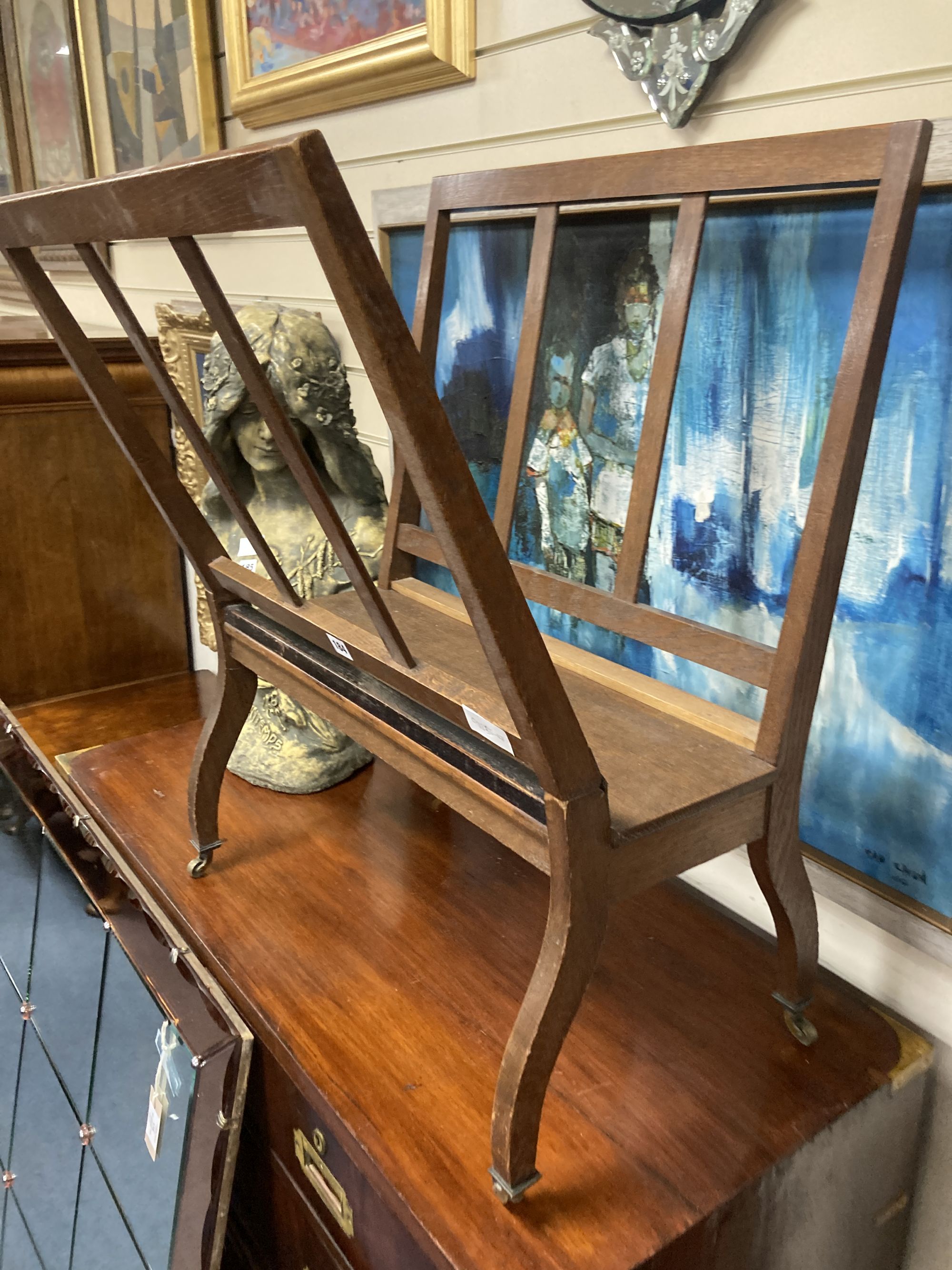 An oak folio stand, width 60cm, depth 24cm, height 76cm